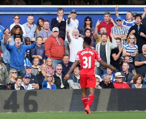 Liverpool s Raheem Sterling celebrates his sides opening goal to the QPR fans - Barclays Premier League - QPR vs Liverpool - Loftus Road - England - 19th October 2014 - Picture David Klein Sportimage EDITORIAL USE ONLY. No use with unauthorised audio, video, data, fixture lists, club league logos or live services. Online in-match use limited to 120 images, no video emulation. No use in betting, games or single club league player publications.