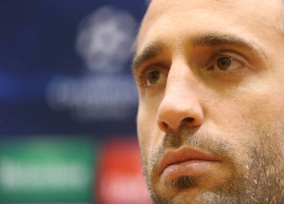 MOSCOW REGION, RUSSIA. OCTOBER 20, 2014. FC Manchester City defender Pablo Zabaleta looks on at a press conference on the upcoming UEFA Champions League group stage football match against CSKA Moscow. The game is to be played behind closed doors as CSKA have been punished for their fans poor behavior. Artyom Korotayev TASS  RE1525DA