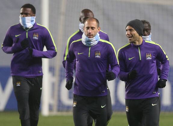 MOSCOW REGION, RUSSIA. OCTOBER 20, 2014. FC Manchester City Sergio Kun AgÃ¼ero and Pablo Zabaleta (R-L) trainingahead of the upcoming UEFA Champions League group stage football match against CSKA Moscow at Arena Khimki Stadium. The game is to be played behind closed doors as CSKA have been punished for their fans poor behavior. Artyom Korotayev TASS  RE1525FC