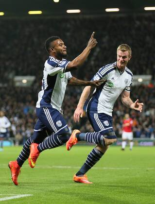 Stephane Sessegnon of West Bromwich Albion turns to celebrate scoring the first goal - Barclays Premier League - WBA vs Manchester Utd - Hawthorns Stadium - West Bromwich - England - 20th October 2014 - Picture Simon Bellis Sportimage EDITORIAL USE ONLY. No use with unauthorised audio, video, data, fixture lists, club league logos or live services. Online in-match use limited to 120 images, no video emulation. No use in betting, games or single club league player publications.