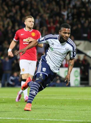Stephane Sessegnon of West Bromwich Albion turns to celebrate scoring the first goal - Barclays Premier League - WBA vs Manchester Utd - Hawthorns Stadium - West Bromwich - England - 20th October 2014 - Picture Simon Bellis Sportimage EDITORIAL USE ONLY. No use with unauthorised audio, video, data, fixture lists, club league logos or live services. Online in-match use limited to 120 images, no video emulation. No use in betting, games or single club league player publications.
