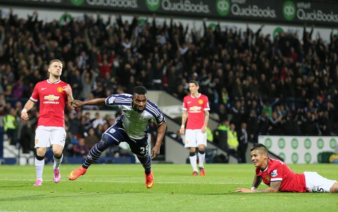 Stephane Sessegnon of West Bromwich Albion turns to celebrate scoring the first goal - Barclays Premier League - WBA vs Manchester Utd - Hawthorns Stadium - West Bromwich - England - 20th October 2014 - Picture Simon Bellis Sportimage EDITORIAL USE ONLY. No use with unauthorised audio, video, data, fixture lists, club league logos or live services. Online in-match use limited to 120 images, no video emulation. No use in betting, games or single club league player publications.