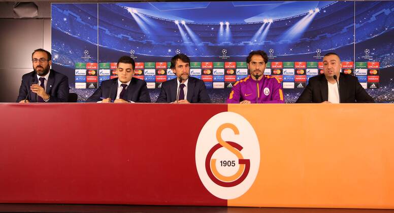 Galatasaray Football Club co trainer Gabriele Pin (C) and Player Hamit Altintop (2R) during the press conference UEFA Champions League soccer match between Galatasaray and Borissia Dortmund in Istanbul 21 October 2014 