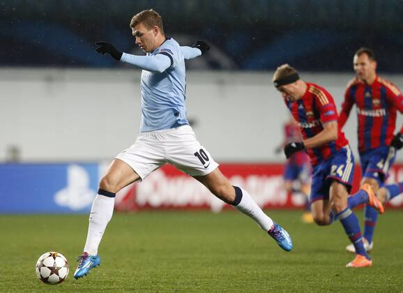 MOSCOW REGION, RUSSIA. OCTOBER 21, 2014. Manchester City s Edin Dzheko kicks the ball in the 2014 15 Season UEFA Champions League Group E Round 3 football match against FC CSKA Moscow at Arena Khimki Stadium. The game is played behind closed doors as CSKA have been punished for their fans poor behavior. Mikhail Japaridze TASS  premiumd 20143763