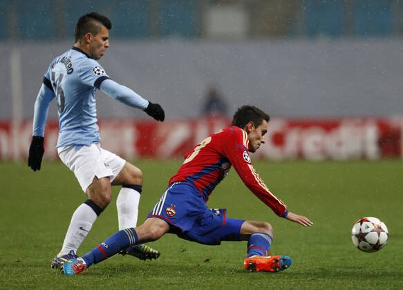 MOSCOW REGION, RUSSIA. OCTOBER 21, 2014. Manchester City s Sergio Kun AgÃ¼ero (L) and CSKA s Georgi Milanov fight for the ball in their 2014 15 Season UEFA Champions League Group E Round 3 football match at Arena Khimki Stadium. The game is played behind closed doors as CSKA have been punished for their fans poor behavior. The game ended in a 2:2 draw. Mikhail Japaridze TASS  premiumd 20143764