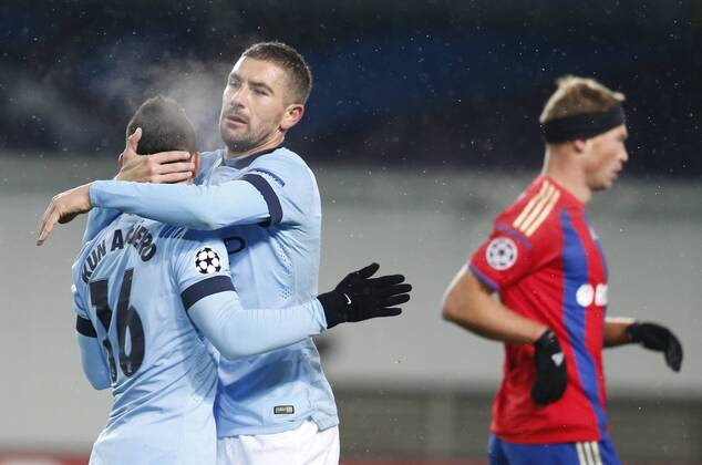 MOSCOW REGION, RUSSIA. OCTOBER 21, 2014. Manchester City s Sergio Kun AgÃ¼ero and Aleksandar Kolarov (L-R) celebrate scoring in the 2014 15 Season UEFA Champions League Group E Round 3 football match against FC CSKA Moscow at Arena Khimki Stadium. The game is played behind closed doors as CSKA have been punished for their fans poor behavior. The game ended in a 2:2 draw. Mikhail Japaridze TASS  premiumd 20143767