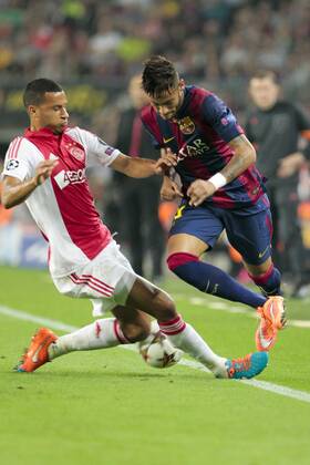 Barcelona, 21.10.2014 - Neymar jr, Ricardo van Rhijn during UEFA Champions League match 2014 2015 between FC Barcelona and Ajax Amsterdam. 