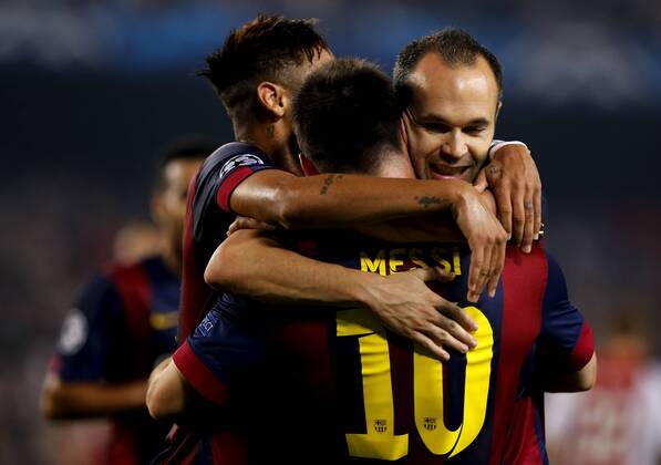 BARCELONA, Oct. 21, 2014 -- Barcelona s Lionel Messi celebrates scoring with teammates during the UEFA Champions League football match against Ajax Amsterdam in Barcelona, Spain, Oct. 21, 2014. Barcelona won 3-1. ) (SP)SPAIN-BARCELONA-UEFA-AJAX PauxBarrena 