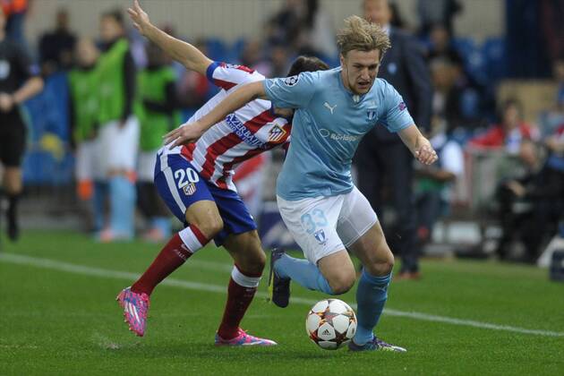 Malmo FF Midfielder, Emil Forsberg - EMIL FORSBERG, number 33 . Atletico de Madrid Defender, Juan Francisco Torres Belen - JUANFRAN, number 20. Round 3 of the CHAMPIONS league, soccer match between Atletico de Madrid - Malmo FF at the Vicente Calderon estadium, Madrid - Spain by October 22, 2014. PHOTO: MIguelLopez. 