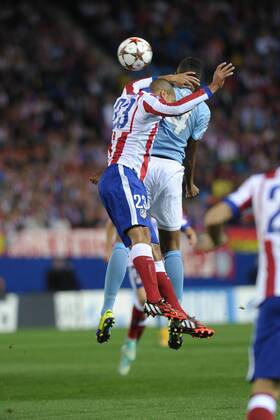 Malmo FF Defender, Filip Helander - FILIP HELANDER, number 4 . Atletico de Madrid Defender, Joao Miranda de Souza Filho - MIRANDA, number 23. Round 3 of the CHAMPIONS league, soccer match between Atletico de Madrid - Malmo FF at the Vicente Calderon estadium, Madrid - Spain by October 22, 2014. PHOTO: MIguelLopez. 