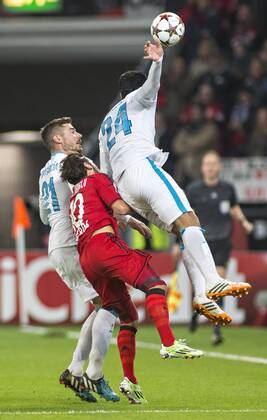 Javi Garcia (Zenit), Hakan Calhanoglu (Bayer), Ezequiel Garay (Zenit) 22.10.2014, Leverkusen, Bayer 04 Leverkusen vs. FC Zenit St.Petersburg Â
