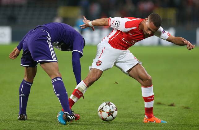 - BRUSSELS, BELGIUM: Anderlecht s Andy Najar and Arsenal s Kieran Gibbs fight for the ball during a third group stage game between RSCA Anderlecht and English team Arsenal, in the group D of the UEFA Champions League competition, Wednesday 22 October 2014. VIRGINIExLEFOUR  premiumd 20144948