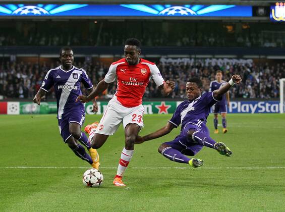Anderlecht s Chancel Mbemba blocks a shot from Arsenal s Danny Welbeck - UEFA Champions League - RSC Anderlecht vs Arsenal - Constant Vanden Stock Stadium - Belgium - 22nd October 2014 - Picture David Klein Sportimage EDITORIAL USE ONLY. No use with unauthorised audio, video, data, fixture lists, club league logos or live services. Online in-match use limited to 120 images, no video emulation. No use in betting, games or single club league player publications.