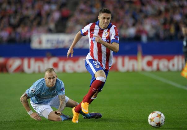 Atletico de Madrid Defender, Ghillherme Magdalena Siqueira - SIQUEIRA, number 3 . Malmo FF Defender, Anton Tinnerholm - ANTON TINNERHOLM, number 3. Round 3 of the CHAMPIONS league, soccer match between Atletico de Madrid - Malmo FF at the Vicente Calderon stadium, Madrid - Spain by October 22, 2014. . 