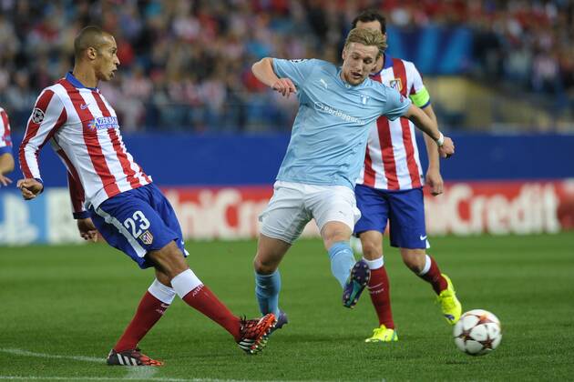 Malmo FF Midfielder, Emil Forsberg - EMIL FORSBERG, number 33 . Atletico de Madrid Defender, Joao Miranda de Souza Filho - MIRANDA, number 23. Round 3 of the CHAMPIONS league, soccer match between Atletico de Madrid - Malmo FF at the Vicente Calderon estadium, Madrid - Spain by October 22, 2014. PHOTO: MIguelLopez. 