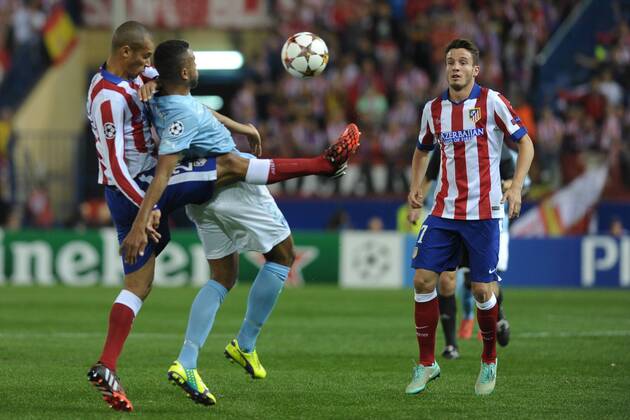 Malmo FF Forward, Isaac Kiese Thelin - ISAAC KIESE THELIN, number 24 . Atletico de Madrid Midfielder, Saul Aiguez Esclapez - SAUL, number 17. Atletico de Madrid Defender, Joao Miranda de Souza Filho - MIRANDA, number 23. Round 3 of the CHAMPIONS league, soccer match between Atletico de Madrid - Malmo FF at the Vicente Calderon estadium, Madrid - Spain by October 22, 2014. PHOTO: MIguelLopez. 
