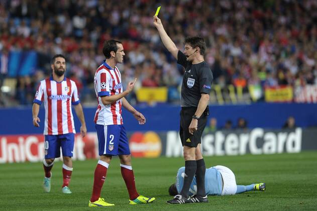 Atletico de Madrid Defender, Diego Roberto Godin Leal - GODIN, number 2 . Atletico de Madrid Midfielder, Arda Turan - ARDA, number 10. Malmo FF Forward, Isaac Kiese Thelin - ISAAC KIESE THELIN, number 24. Round 3 of the CHAMPIONS league, soccer match between Atletico de Madrid - Malmo FF at the Vicente Calderon estadium, Madrid - Spain by October 22, 2014. PHOTO: MIguelLopez. 