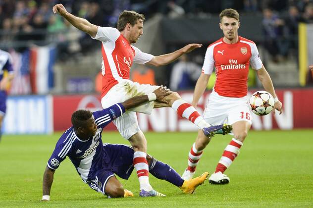 - BRUSSELS, BELGIUM: Anderlecht s Cyriac Gohi Bi Zoro and Arsenal s Nacho Monreal fight for the ball during a third group stage game between RSCA Anderlecht and English team Arsenal, in the group D of the UEFA Champions League competition, Wednesday 22 October 2014. LAURIExDIEFFEMBACQ  premiumd 20145084