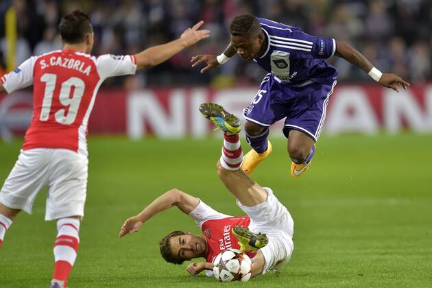 Zoro Cyriac Gohi Bi of RSC Anderlecht battles for the ball with Mathieu Flamini of Arsenal FOOTBALL : Anderlecht vs Arsenal - Ligue des Champions - 3e journee - Gr D - 22 10 2014 Photonews Panoramic 