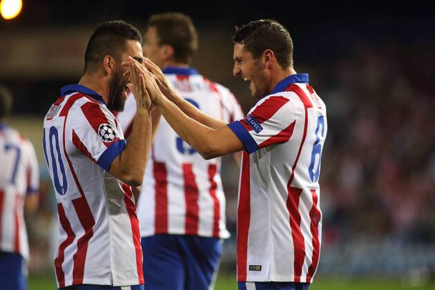 Madrid, Spain. 22th October 2014: Koke Resurreccion midfielder from Atletico de Madrid, celebrating after scoring during the UEFA Champions League group stage against Malmö FF at the Vicente Calderon stadium. (Photo: IvanAbanadesMedina). 