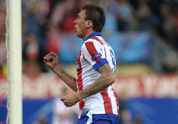 Atletico de Madrid Forward, Mario Mandzukic - MANDZUKIC, number 9 celebrates after scoring a goal (2,0). Round 3 of the CHAMPIONS league, soccer match between Atletico de Madrid - Malmo FF at the Vicente Calderon estadium, Madrid - Spain by October 22, 2014. PHOTO: MIguelLopez. 