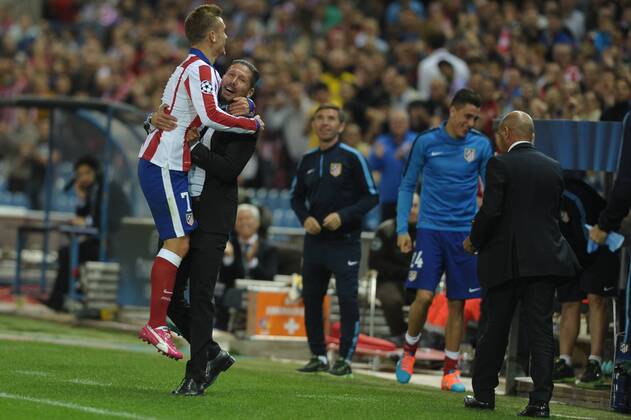 Atletico de Madrid Forward, Antoine Griezmann - GRIEZMANN, number 7 celebrates after scoring a goal (3,0). Atletico de Madrid Coach, Diego Pablo Simeone - SIMEONE. Round 3 of the CHAMPIONS league, soccer match between Atletico de Madrid - Malmo FF at the Vicente Calderon estadium, Madrid - Spain by October 22, 2014. PHOTO: MIguelLopez. 