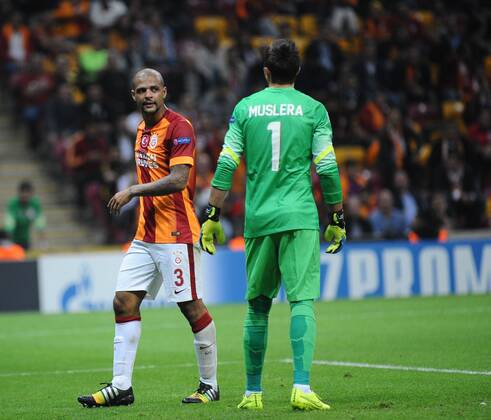 UEFA Champions League Group D match between Galatasaray and Borussia Dortmund at Turk Telekom Arena on October 22, 2014 in Istanbul, Turkey. Pictured: Goalkeeper Fernando Muslera and Felipe Melo of Galatasaray. 