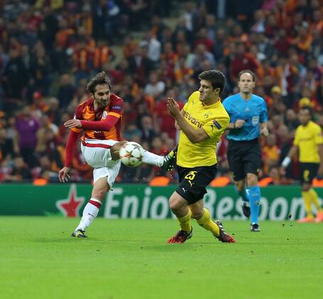 UEFA Champions League Group D match between Galatasaray and Borussia Dortmund at Turk Telekom Arena on October 22, 2014 in Istanbul, Turkey. Pictured: Hamit Alintop of Galatasaray and Sokratis of Borussia Dortmund. 