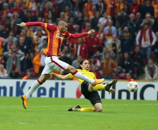 UEFA Champions League Group D match between Galatasaray and Borussia Dortmund at Turk Telekom Arena on October 22, 2014 in Istanbul, Turkey. Pictured: Burak Yilmaz of Galatasaray and Neven Subotic of Borussia Dortmund. 