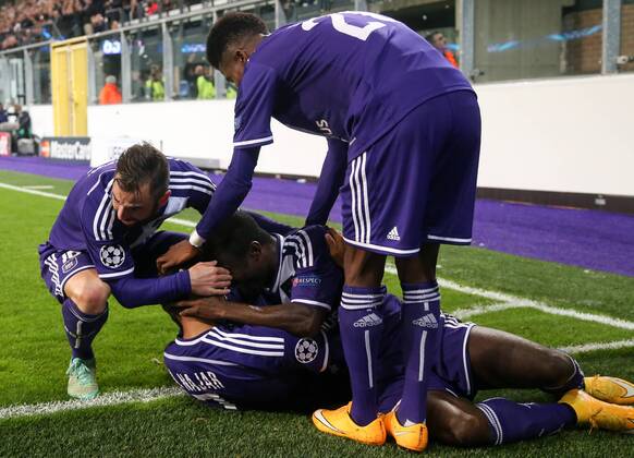 - BRUSSELS, BELGIUM: Anderlecht s Andy Najar (lower) celebrates with his teammates after scoring during a third group stage game between RSCA Anderlecht and English team Arsenal, in the group D of the UEFA Champions League competition, Wednesday 22 October 2014. VIRGINIExLEFOUR  premiumd 20145237