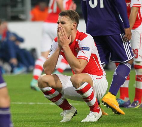 Arsenal s Aaron Ramsey looks on dejected - UEFA Champions League - RSC Anderlecht vs Arsenal - Constant Vanden Stock Stadium - Belgium - 22nd October 2014 - Picture David Klein Sportimage EDITORIAL USE ONLY. No use with unauthorised audio, video, data, fixture lists, club league logos or live services. Online in-match use limited to 120 images, no video emulation. No use in betting, games or single club league player publications.