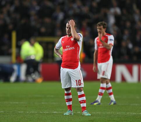 Arsenal s Jack Wilshere looks on dejected - UEFA Champions League - RSC Anderlecht vs Arsenal - Constant Vanden Stock Stadium - Belgium - 22nd October 2014 - Picture David Klein Sportimage EDITORIAL USE ONLY. No use with unauthorised audio, video, data, fixture lists, club league logos or live services. Online in-match use limited to 120 images, no video emulation. No use in betting, games or single club league player publications.