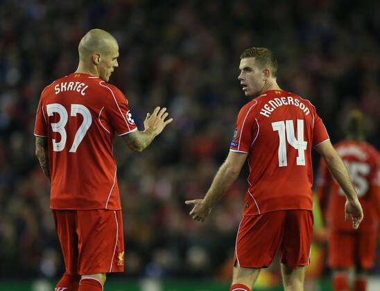 Jordan Henderson of Liverpool questions Martin Skrtel of Liverpool - UEFA Champions League Group B - Liverpool vs Real Madrid - Anfield Stadium - Liverpool- England - 22nd October 2014 - Picture Simon Bellis Sportimage EDITORIAL USE ONLY. No use with unauthorised audio, video, data, fixture lists, club league logos or live services. Online in-match use limited to 120 images, no video emulation. No use in betting, games or single club league player publications.