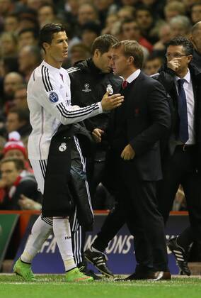 Cristiano Ronaldo of Real Madrid pats Brendan Rodgers manager of Liverpool as he is comes off the pitch - UEFA Champions League Group B - Liverpool vs Real Madrid - Anfield Stadium - Liverpool- England - 22nd October 2014 - Picture Simon Bellis Sportimage EDITORIAL USE ONLY. No use with unauthorised audio, video, data, fixture lists, club league logos or live services. Online in-match use limited to 120 images, no video emulation. No use in betting, games or single club league player publications.