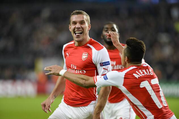 - BRUSSELS, BELGIUM: Arsenal s Lukas Podolski celebrates after scoring during a third group stage game between RSCA Anderlecht and English team Arsenal, in the group D of the UEFA Champions League competition, Wednesday 22 October 2014. LAURIExDIEFFEMBACQ  premiumd 20145315