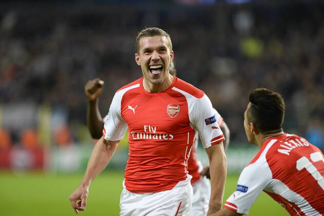 - BRUSSELS, BELGIUM: Arsenal s Lukas Podolski celebrates after scoring during a third group stage game between RSCA Anderlecht and English team Arsenal, in the group D of the UEFA Champions League competition, Wednesday 22 October 2014. LAURIExDIEFFEMBACQ  premiumd 20145316
