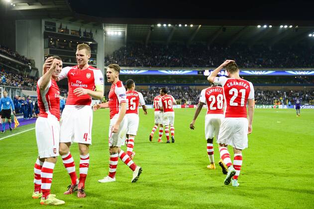 - BRUSSELS, BELGIUM: Arsenal s Lukas Podolski (L) and Arsenal s players celebrate after scoring during a third group stage game between RSCA Anderlecht and English team Arsenal, in the group D of the UEFA Champions League competition, Wednesday 22 October 2014. LAURIExDIEFFEMBACQ  premiumd 20145323