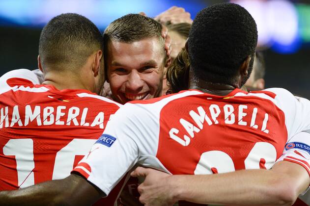 - BRUSSELS, BELGIUM: Arsenal s Lukas Podolski (C) celebrates with his teammates after scoring during a third group stage game between RSCA Anderlecht and English team Arsenal, in the group D of the UEFA Champions League competition, Wednesday 22 October 2014. LAURIExDIEFFEMBACQ  premiumd 20145350