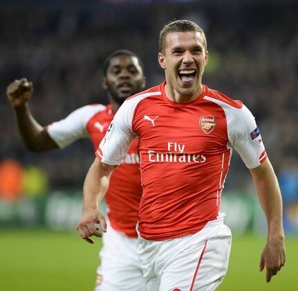 - BRUSSELS, BELGIUM: Arsenal s Lukas Podolski celebrates after scoring during a third group stage game between RSCA Anderlecht and English team Arsenal, in the group D of the UEFA Champions League competition, Wednesday 22 October 2014. LAURIExDIEFFEMBACQ  premiumd 20145351