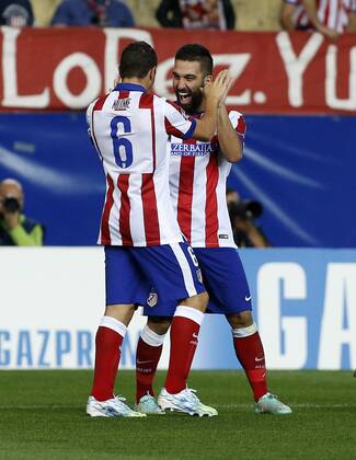 Champions League match between Atletico Madrid and Malmö FF. In this picture,, Arda Turan and Koke celebrates a goal. xJOSExA.xGARCIAx 
