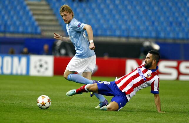 Champions League match between Atletico Madrid and Malmö FF. In this picture, Emil Tinnerhold and Arda Turan. xRAFAxCASALx 