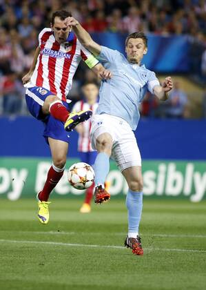 Champions League match between Atletico Madrid and Malmö FF. In this picture, Diego Godin and Markus Rosenberg. xJOSExA.xGARCIAx 