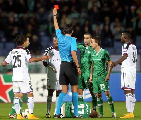 22.10.2014 Sofia(Bulgaria) PFC Ludogorets - FC Basel UEFA Champions League men s football Geoffroy Serey Die(5th from right) FC Basel receive red card from Deniz Aytekin(4th from right) German referee beside Georgi Terziev (3rd from right) and Yordan Minev (2nd from right) PFC Ludogorets :Stringer 