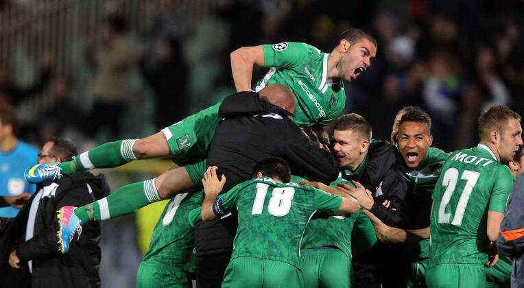22.10.2014 Sofia(Bulgaria) PFC Ludogorets - FC Basel UEFA Champions League men s football Georgi Terziev(L),Roman Bezjak(2L),Anicet Abel(3L) and (r) PFC Ludogorets celebrate victory after match :Stringer 