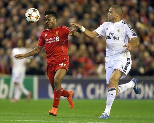 Raheem Sterling of Liverpool tussles with Pepe of Real Madrid - UEFA Champions League Group B - Liverpool vs Real Madrid - Anfield Stadium - Liverpool- England - 22nd October 2014 - Picture Simon Bellis Sportimage EDITORIAL USE ONLY. No use with unauthorised audio, video, data, fixture lists, club league logos or live services. Online in-match use limited to 120 images, no video emulation. No use in betting, games or single club league player publications.