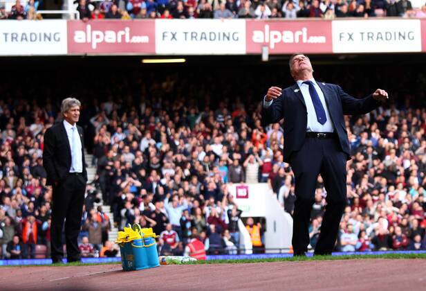 West Ham United v Manchester City . . London, UK . . 25.10.2014 Manuel Pellegrini (Man City manager) and Sam Allardyce (West Ham manager)