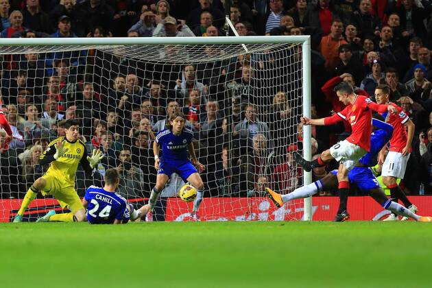 Robin van Persie of Manchester United scores in injury time to level it at 1-1 - Manchester United vs. Chelsea - Barclay s Premier League - Old Trafford - Manchester - 26 10 2014 Pic Philip Oldham Sportimage EDITORIAL USE ONLY. No use with unauthorised audio, video, data, fixture lists, club league logos or live services. Online in-match use limited to 120 images, no video emulation. No use in betting, games or single club league player publications.