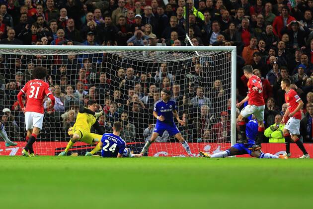 Robin van Persie of Manchester United scores in injury time to level it at 1-1 - Manchester United vs. Chelsea - Barclay s Premier League - Old Trafford - Manchester - 26 10 2014 Pic Philip Oldham Sportimage EDITORIAL USE ONLY. No use with unauthorised audio, video, data, fixture lists, club league logos or live services. Online in-match use limited to 120 images, no video emulation. No use in betting, games or single club league player publications.
