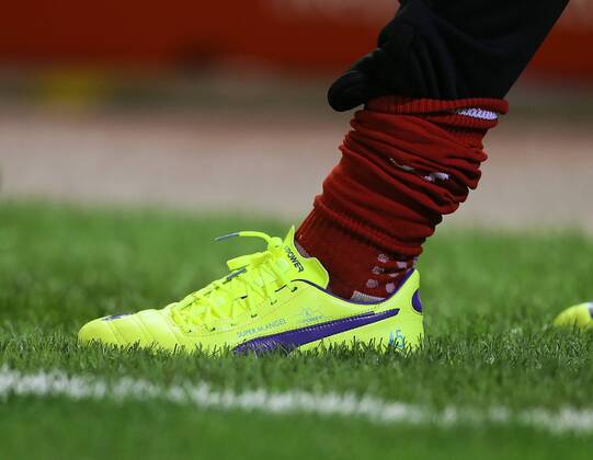 Liverpool s Mario Balotelli wears boots with the inscription Super M.Angel League Cup Fourth Round- Liverpool vs Swansea City - Anfield - England - 28th October 2014 - Picture David Klein Sportimage EDITORIAL USE ONLY. No use with unauthorised audio, video, data, fixture lists, club league logos or live services. Online in-match use limited to 120 images, no video emulation. No use in betting, games or single club league player publications.