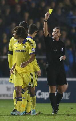Yellow card for Nathan Ake of Chelsea - Capital One Cup - Shrewsbury Town vs Chelsea - Greenhous Meadow Stadium - Shrewsbury - England - 28th October 2014 - Picture SimonBellis Sportimage EDITORIAL USE ONLY. No use with unauthorised audio, video, data, fixture lists, club league logos or live services. Online in-match use limited to 120 images, no video emulation. No use in betting, games or single club league player publications.